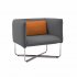Groove sofa with orange pillow